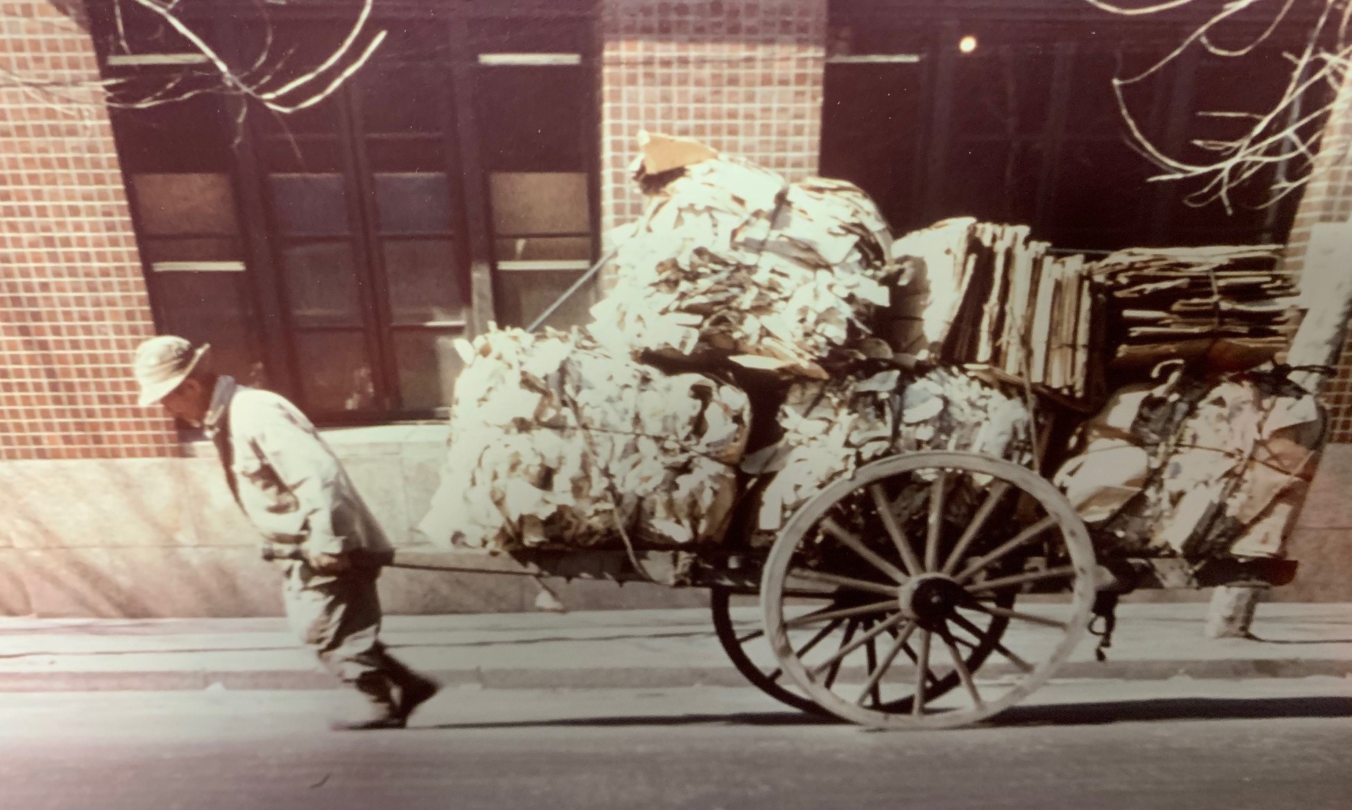 Recycling in Massachusetts has come a long way from a man pulling a cart filled with bundles of paper and cardboard.