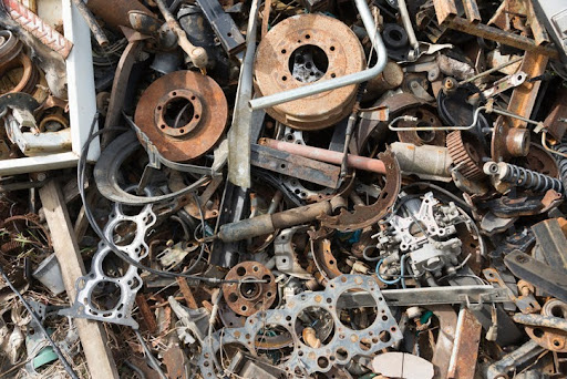 A photo of a mixed collection of scrap metal. Current scrap metal prices will likely change in 2024 due to a variety of global factors.