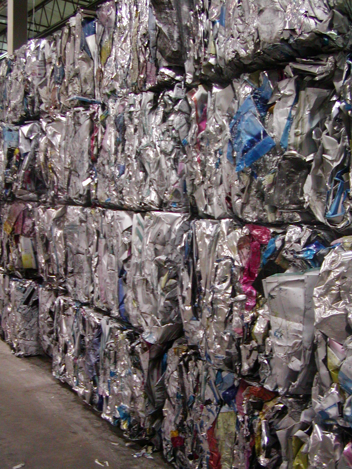 Stacked recycled material. Recycling services.