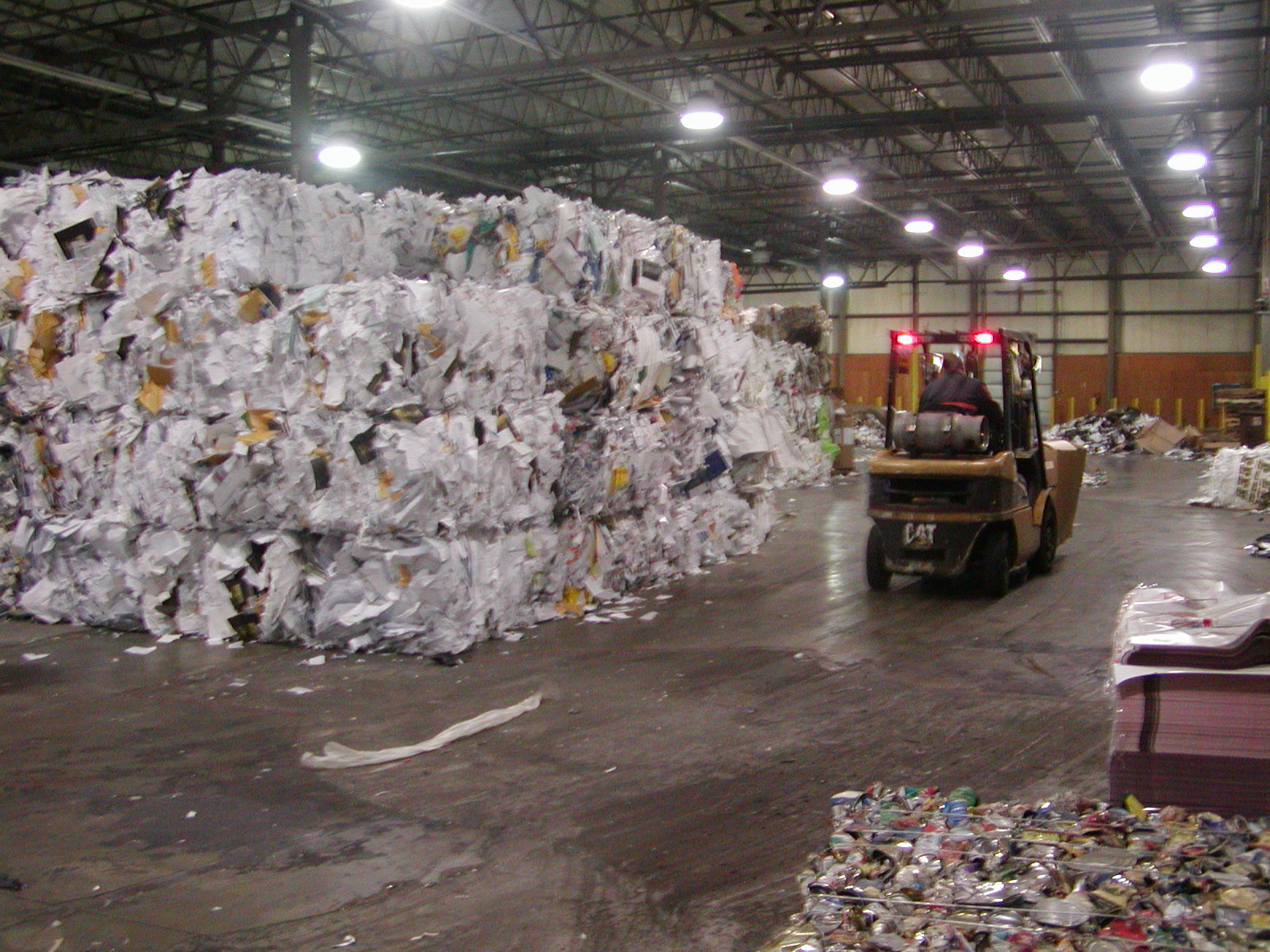 Baled paper in a commercial recycling center. Here’s an overview of the current state of commercial recycling in Massachusetts and beyond.