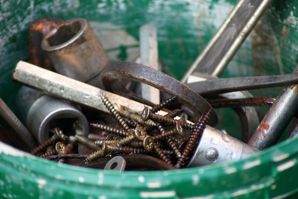 example of mixed metal pieces showing why it’s important to learn how to clean and separate scrap metal before recycling